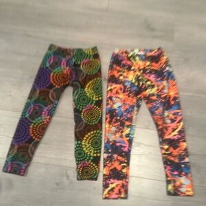Two pairs of Size 4 leggings - Splatter (Rock Candy) & Circles (Dori Creations)
